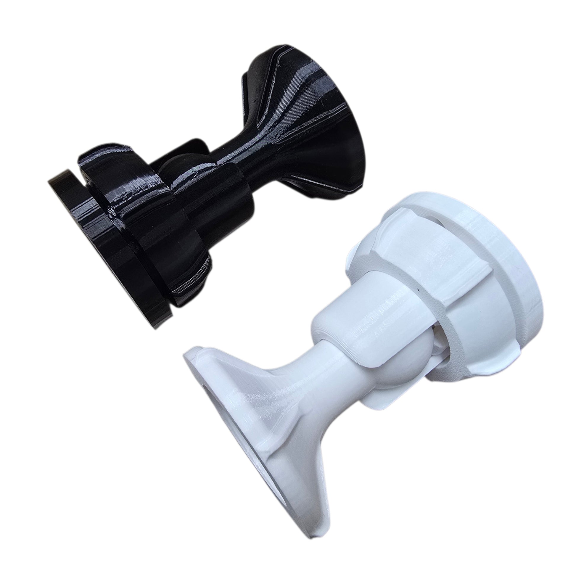 Black and white plastic components on a white background