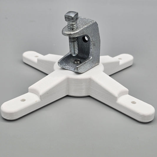 White plastic clamp with metal component on a gray background