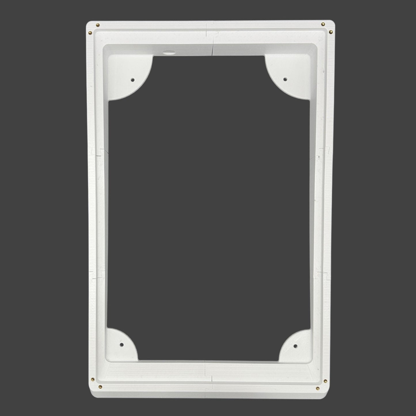 White rectangular frame with rounded corners on a black background