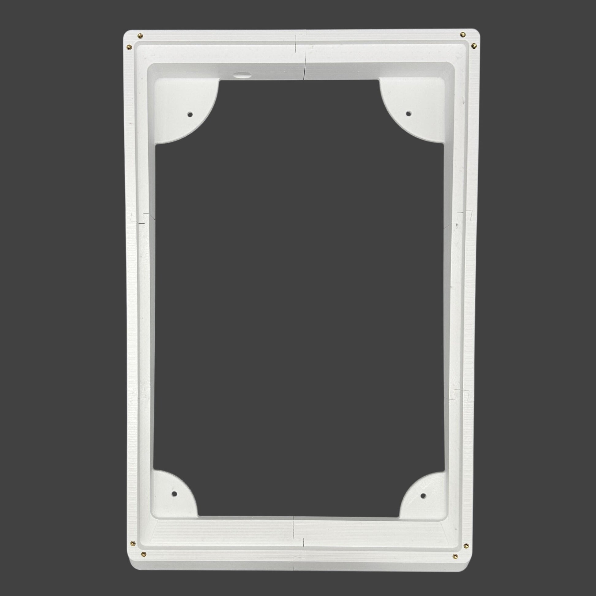 White rectangular frame with rounded corners on a black background